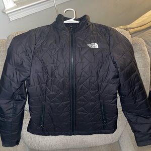 The North Face Black Puffer Jacket size small. In EUC, no flaws.